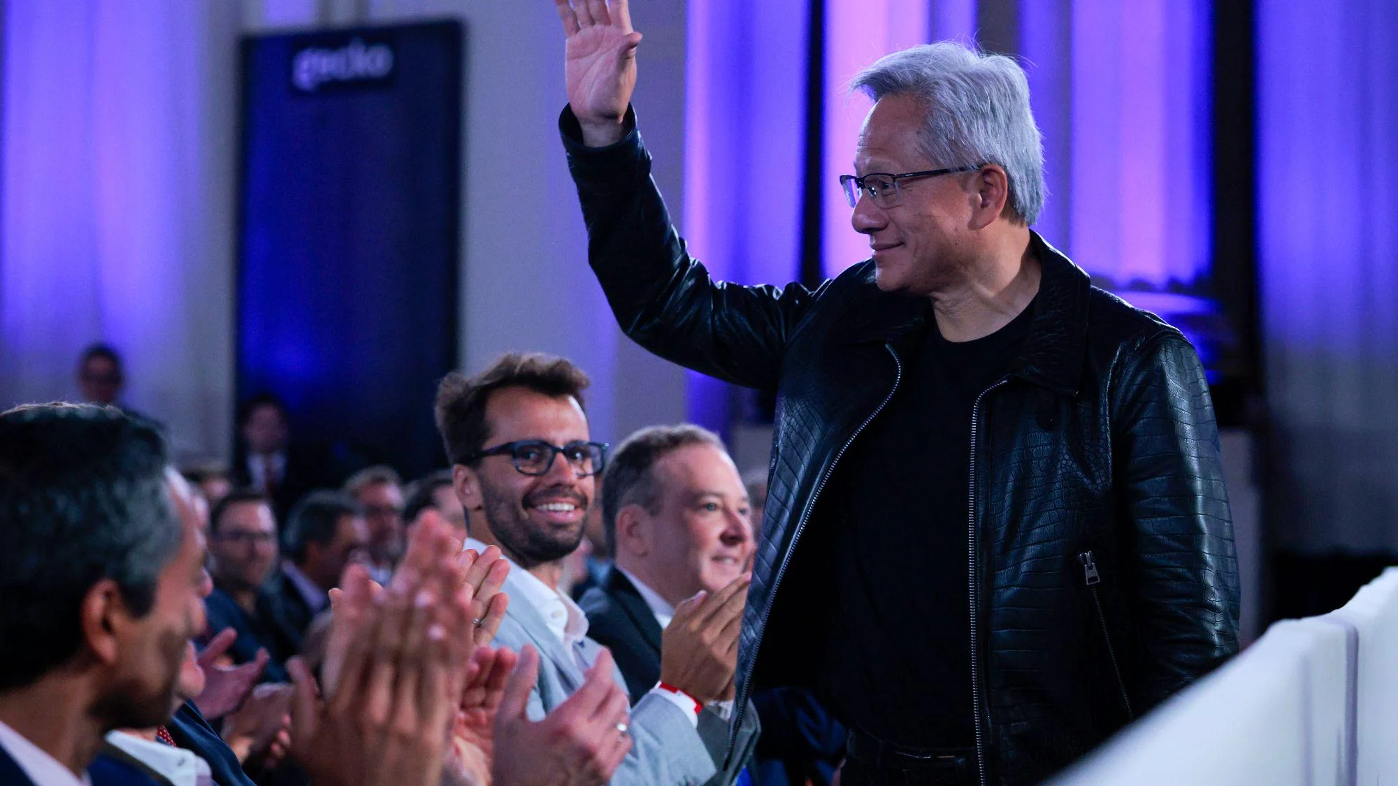Nvidia CEO Jensen Huang speaking at AI industry event amid UAE chip deal tensions
