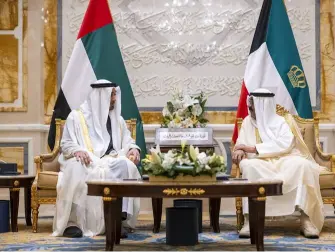 UAE and Kuwait leaders shaking hands during high-level meeting on regional developments