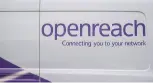 Openreach engineer installing fibre broadband cables in UK neighborhood