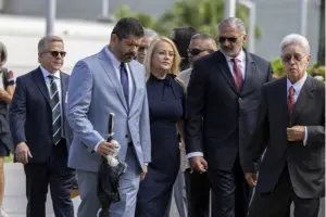 Former Puerto Rico Governor Wanda Vázquez and banker Julio Herrera Velutini arrive at the federal courthouse in San Juan, Puerto Rico, August 27, 2025.